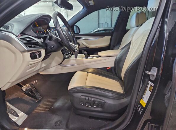 5UXKU6C31H0W38757 2017 BMW X6 Black Vista interior delantera