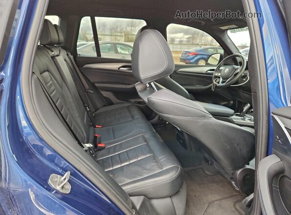 5UXTY5C00L9D10262 2020 BMW X3 Blue Vista interior trasera