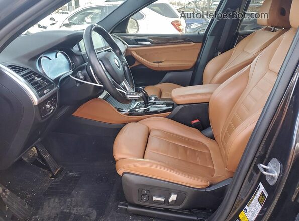 5UXUJ3C57KLA58326 2019 BMW X4 Charcoal Vista interior delantera
