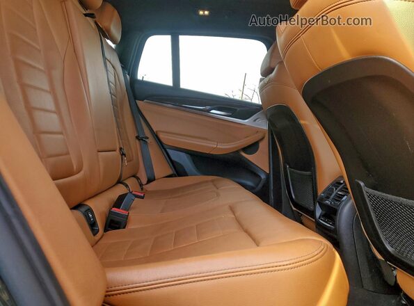 5UXUJ3C57KLA58326 2019 BMW X4 Charcoal Vista interior trasera