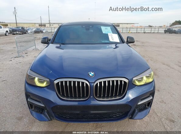 5UXUJ5C51KLJ64229 2019 BMW X4 Blue Rear interior view