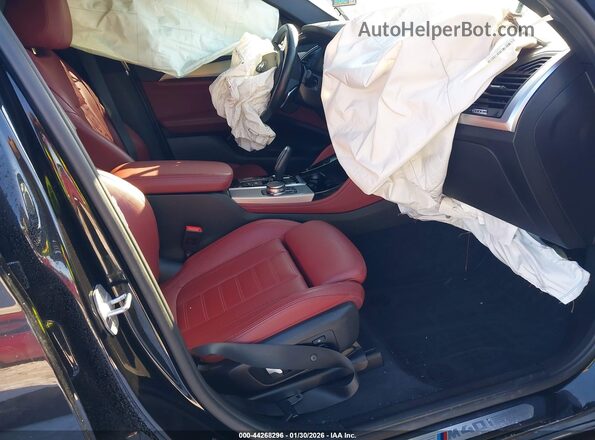 5UXUJ5C53KLJ62823 2019 BMW X4 Black Front interior view
