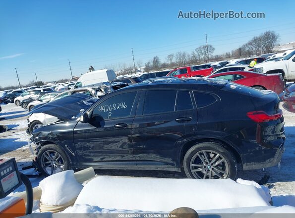 5UXUJ5C53KLJ62823 2019 BMW X4 Black Rear interior view