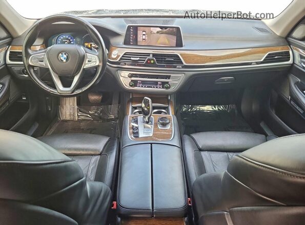 WBA7F0C56JGM23966 2018 BMW 7 SERIES Silver Rear seats view