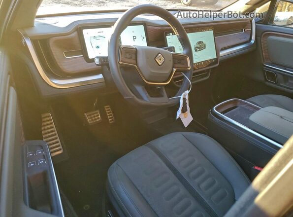 7FCTGAAL1PN024354 2023 RIVIAN R1T Green Widok deski rozdzielczej