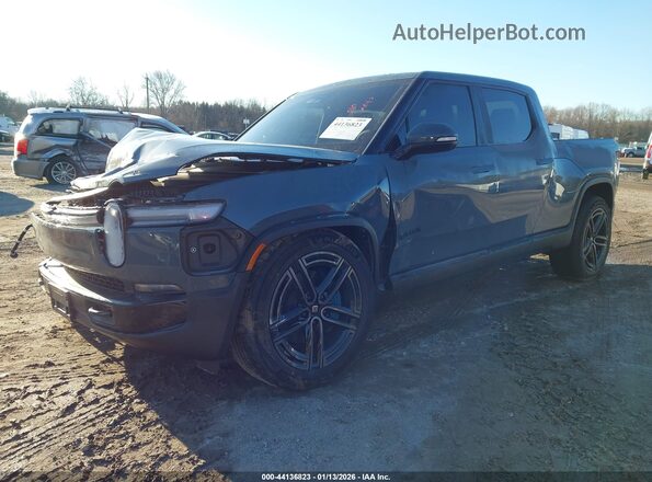 7FCTGAAP4TN043560 2026 RIVIAN R1T Teal Vista tres cuartos delantera izquierda