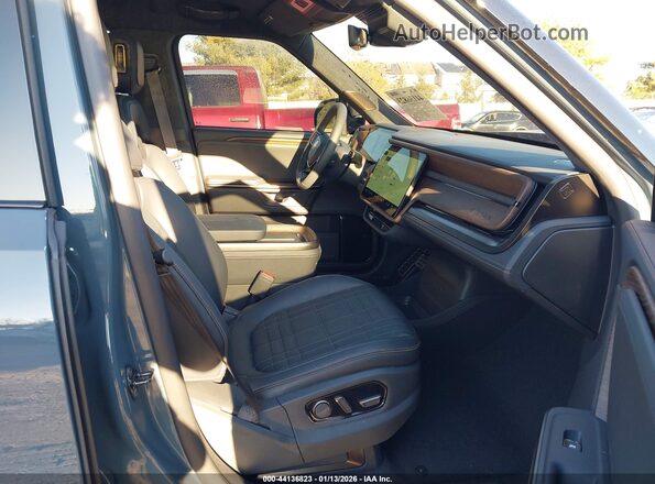 7FCTGAAP4TN043560 2026 RIVIAN R1T Teal Vista interior delantera
