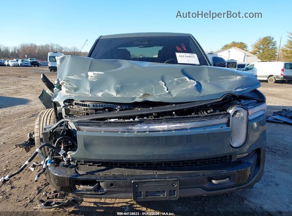 7FCTGAAP4TN043560 2026 RIVIAN R1T Teal Vista del salpicadero