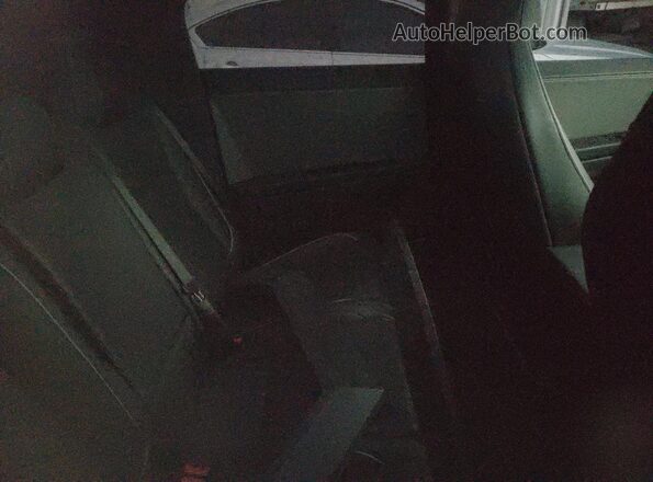 7G2CEHED1RA053937 2024 TESLA CYBERTRUCK Silver უკანა სავარძლების ხედი