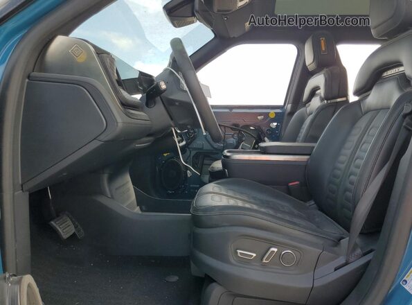 7PDSGBBA4SN060965 2025 RIVIAN R1S Blue Вид салону спереду