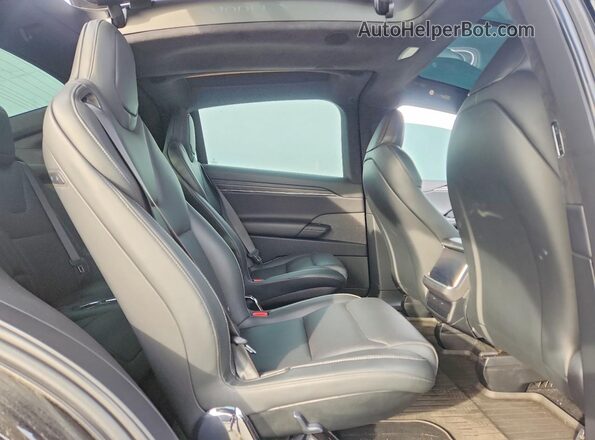 7SAXCBE66PF428457 2023 TESLA MODEL Silver Vista interior trasera