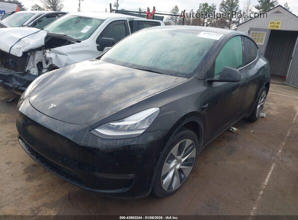 7SAYGAEE0NF573937 2022 TESLA MODEL Y Blue წინა მარცხენა ხედი სამი მეოთხედიდან