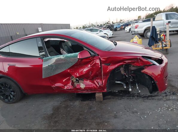 7SAYGDED6RF129542 2024 TESLA MODEL Y Burgundy 