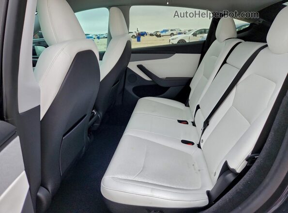 7SAYGDEE1TA465788 2026 TESLA MODEL Gray Vista de los asientos traseros