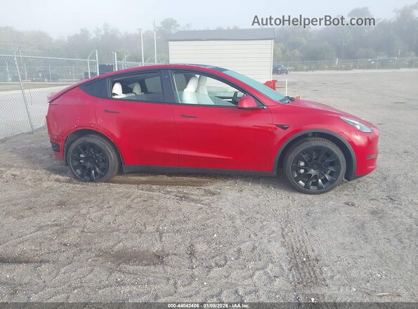 7SAYGDEE4PF745231 2023 TESLA MODEL Y Red Սալոնի հետևի տեսք