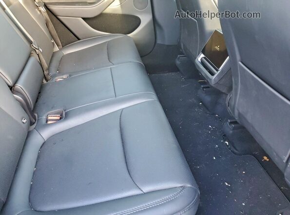 7SAYGDEE7TA397299 2026 TESLA MODEL Black Vista de los asientos traseros