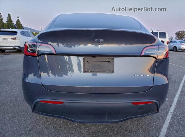 7SAYGDEE8PA129626 2023 TESLA MODEL Silver Rear view