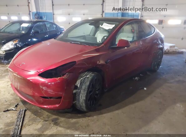 7SAYGDEFXSA352414 2025 TESLA MODEL Y Red წინა მარცხენა ხედი სამი მეოთხედიდან