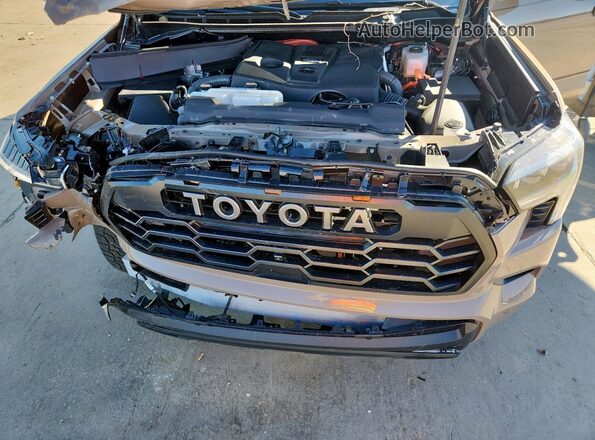 7SVAAABA0SX067579 2025 TOYOTA SEQUOIA Tan Вид підкапотного простору