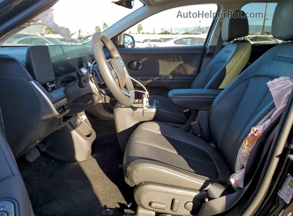 7YAKN4DA2SY019148 2025 HYUNDAI IONIQ Black Vista interior delantera