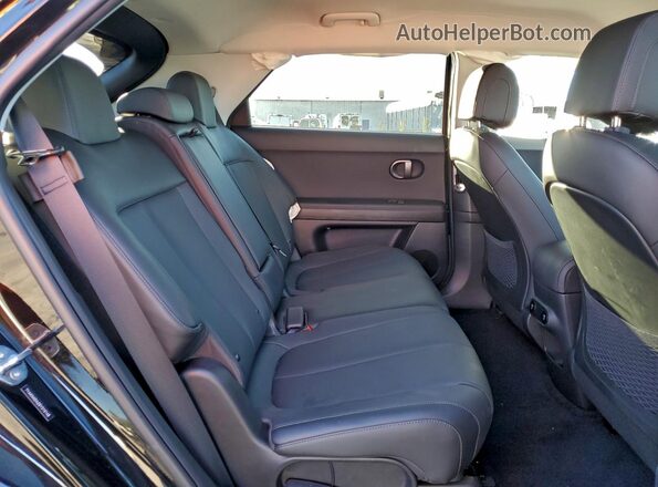 7YAKN4DA2SY019148 2025 HYUNDAI IONIQ Black Vista de los asientos traseros