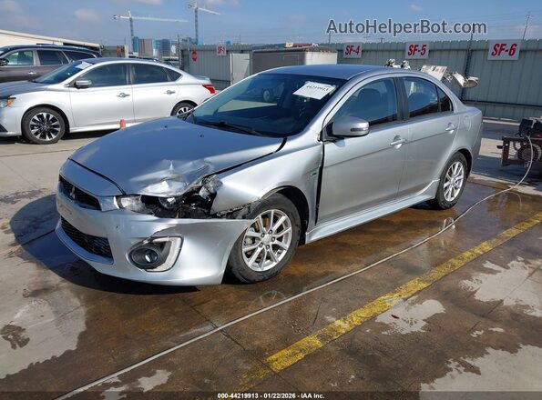 JA32U2FU0GU012914 2016 MITSUBISHI LANCER Серебряный Передняя левая четверть