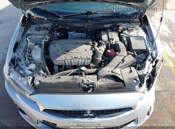 JA32U2FU0GU012914 2016 MITSUBISHI LANCER Серебряный Вид сзади