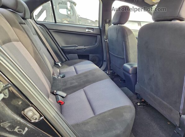 JA32U2FU7HU014015 2017 MITSUBISHI LANCER Черный Вид задних сидений