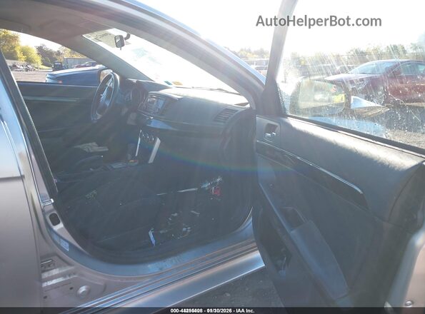 JA32U2FUXGU005629 2016 MITSUBISHI LANCER Silver წინა სალონის ხედი