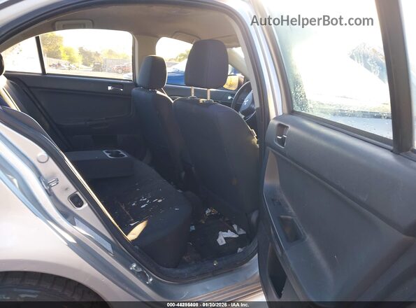 JA32U2FUXGU005629 2016 MITSUBISHI LANCER Silver VIN კოდის სტიკერის ხედი