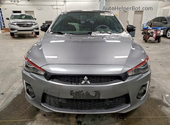 JA32V2FW6HU607671 2017 MITSUBISHI LANCER Серебряный Вид спереди