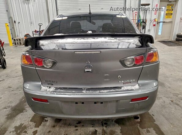 JA32V2FW6HU607671 2017 MITSUBISHI LANCER Серебряный Вид сзади