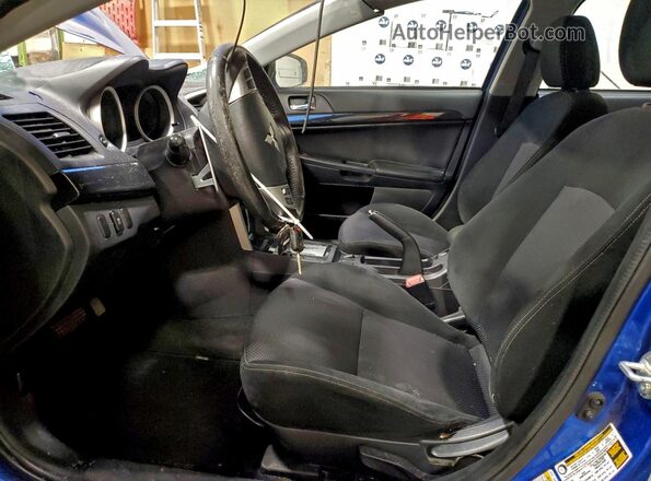 JA32V2FW7GU601800 2016 MITSUBISHI LANCER Blue Widok wnętrza z przodu