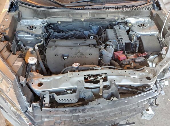 JA4APUAU4MU036713 2021 MITSUBISHI OUTLANDER Silver Vista del compartimento del motor