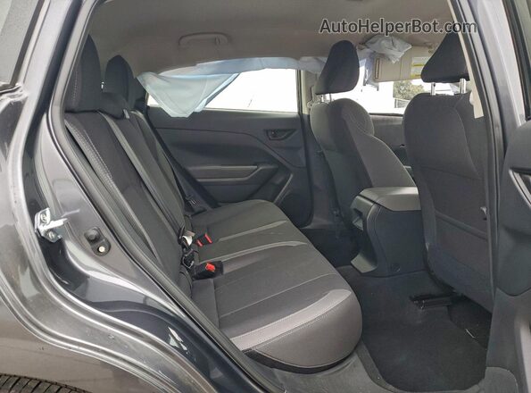 JF1GUABC8S8286688 2025 SUBARU IMPREZA Gray Rear seats view