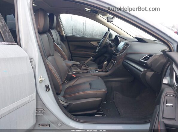 JF2GTHNC8M8369821 2021 SUBARU CROSSTREK Blue Widok wnętrza z przodu