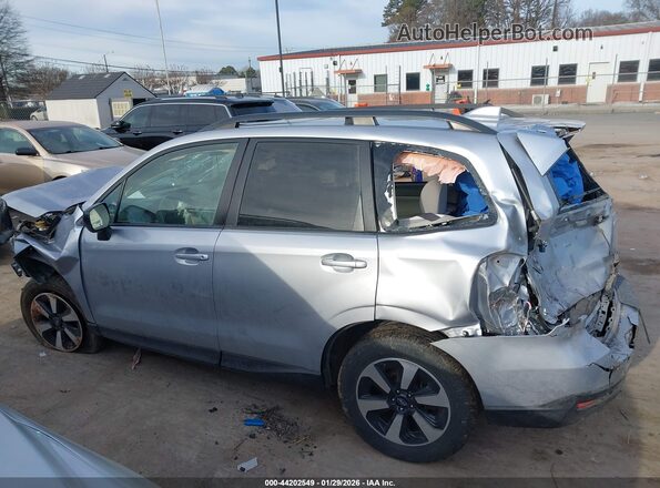 JF2SJADC3HH552848 2017 SUBARU FORESTER 2.5 Silver Vista interior trasera