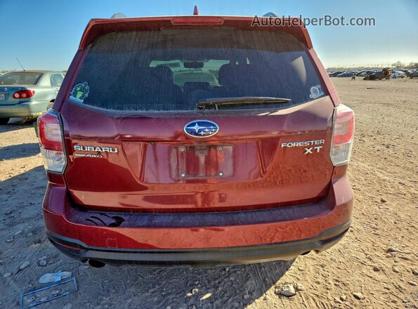 JF2SJGEC8JH446676 2018 SUBARU FORESTER2. Maroon Vista trasera