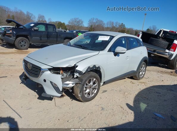 JM1DKDB70M1504562 2021 MAZDA CX-3 Cream Vista tres cuartos delantera izquierda