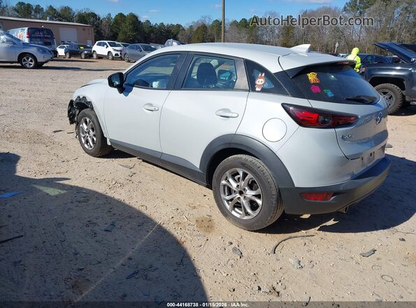 JM1DKDB70M1504562 2021 MAZDA CX-3 Cream Trasero izquierdo