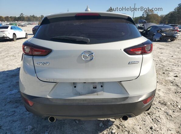 JM1DKDB75K1436398 2019 MAZDA CX-3 Gray Rear view