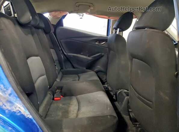 JM1DKFB79H0167977 2017 MAZDA CX-3 Blue Vista interior trasera