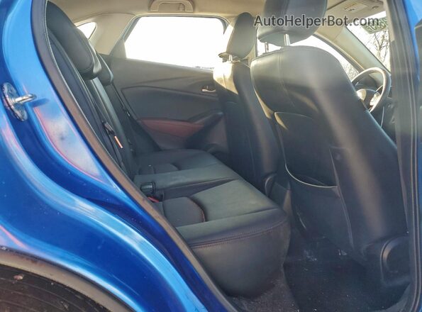 JM1DKFC70G0138901 2016 MAZDA CX-3 Blue Vista de los asientos traseros