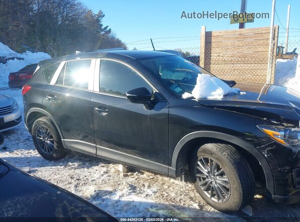 JM3KE2BY7G0879491 2016 MAZDA CX-5 Black Սալոնի հետևի տեսք