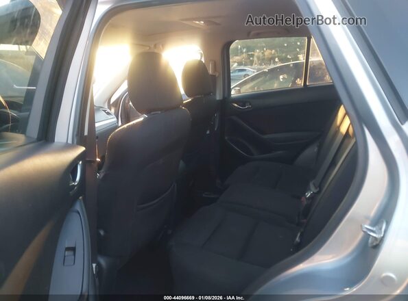 JM3KE2CY1G0675929 2016 MAZDA CX-5 Silver VIN კოდის სტიკერის ხედი