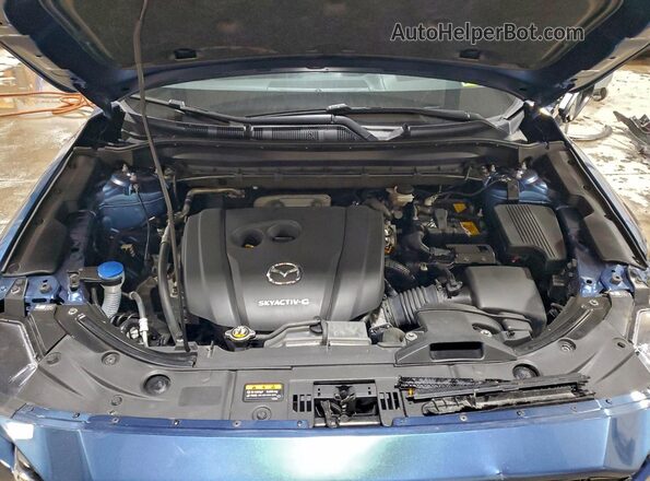 JM3KFBEM4N1560658 2022 MAZDA CX-5 Blue Vista del compartimento del motor
