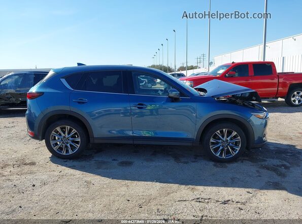 JM3KFBEY2M0457262 2021 MAZDA CX-5 Blue Սալոնի հետևի տեսք