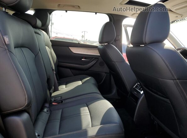 JM3KKBHA7R1157583 2024 MAZDA CX-90 Черный Вид задней части салона