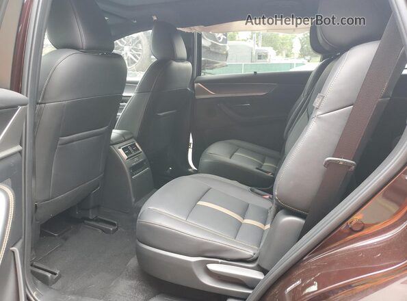 JM3KKEHA2R1167830 2024 MAZDA CX-90 Maroon Vista interior trasera