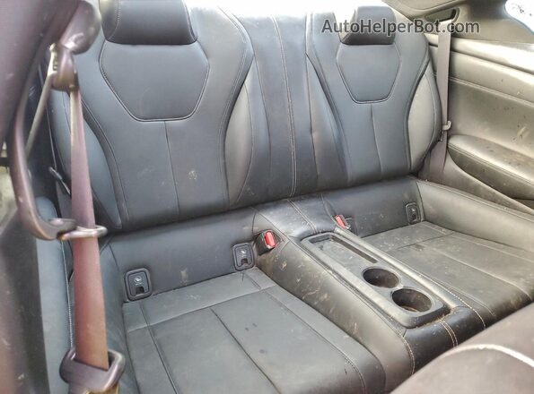JN1CV7EK9HM110134 2017 INFINITI Q60 Black Rear seats view